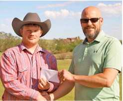 COOPER KING (left) receives a ….